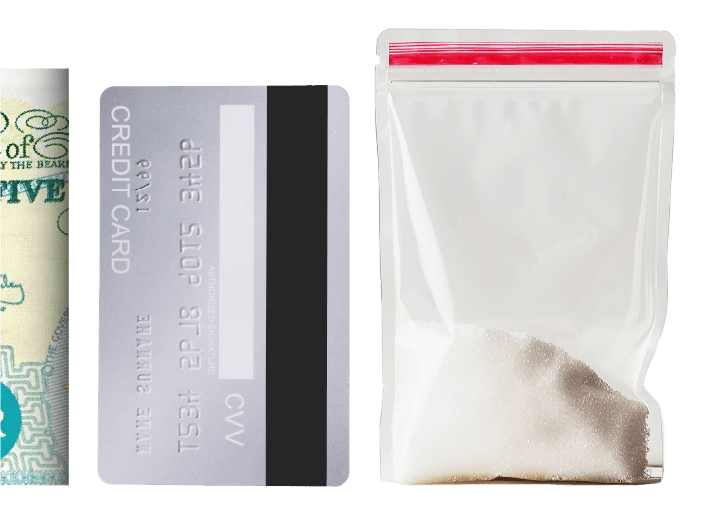 bag of ketamine, rolled up pound note, bank card